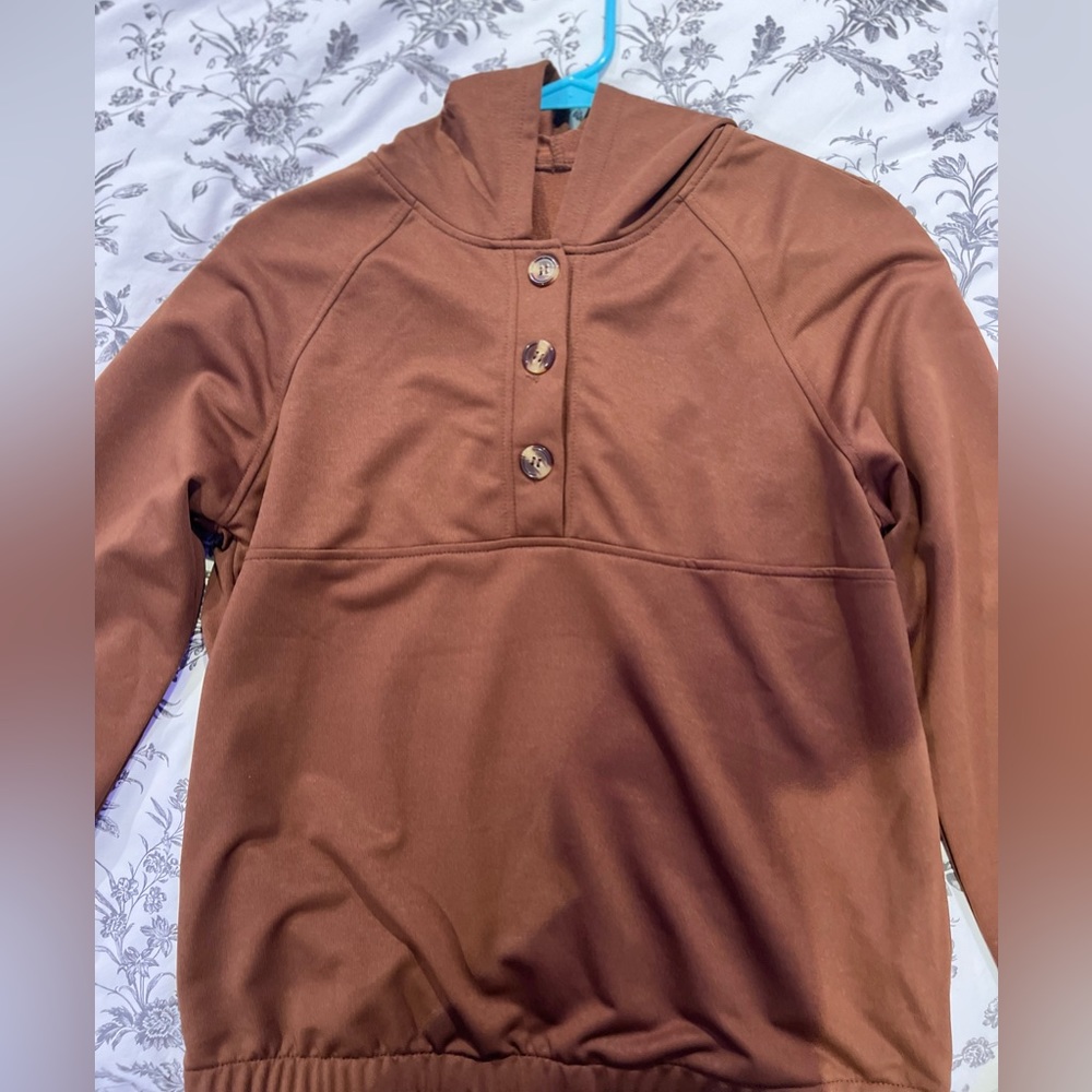 this is a brown hoodie that is a S!